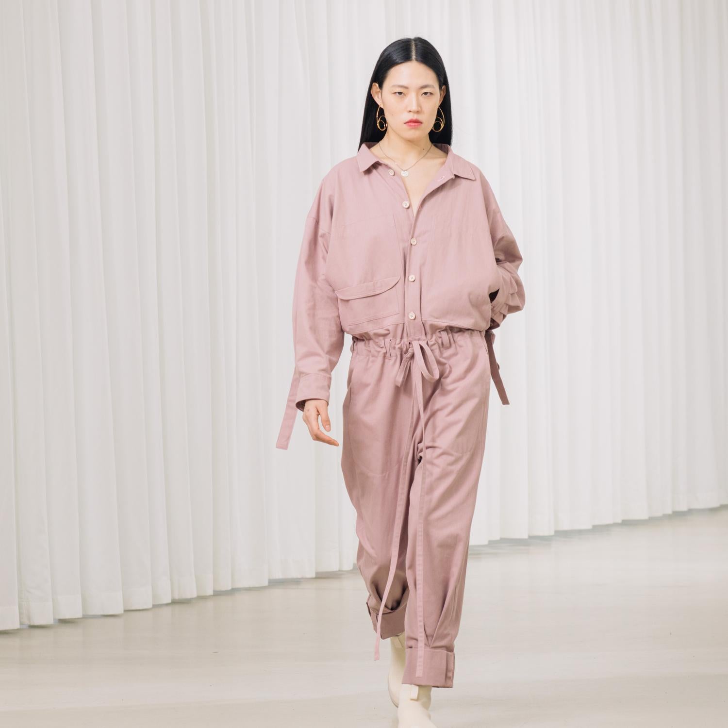 jumpsuit with gathering across the back and multiple pockets