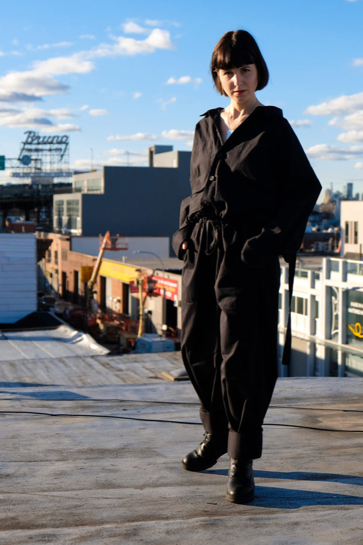 jumpsuit with gathering across the back and multiple pockets