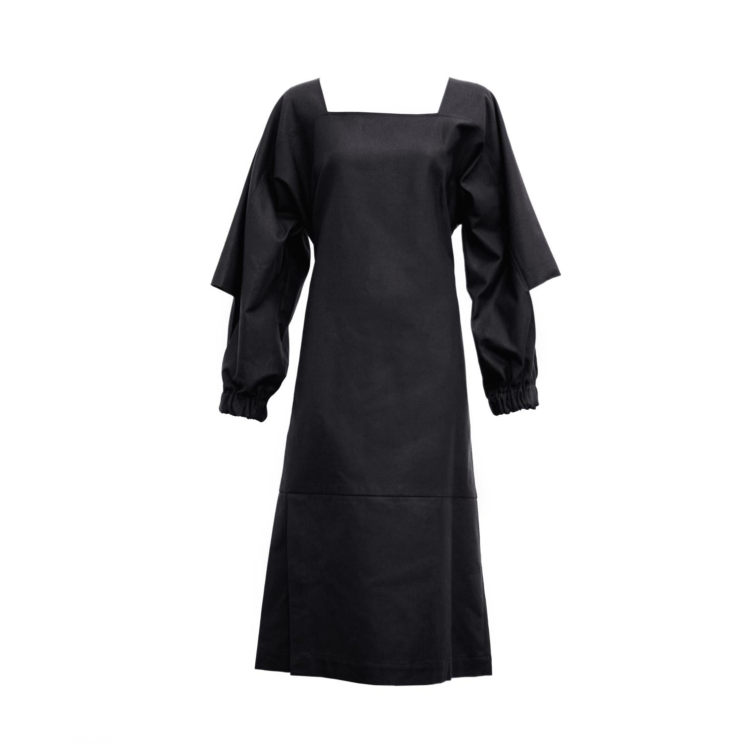 extravagant midi dress with cut out sleeves by Natascha von Hirschhausen fashion design made in Berlin