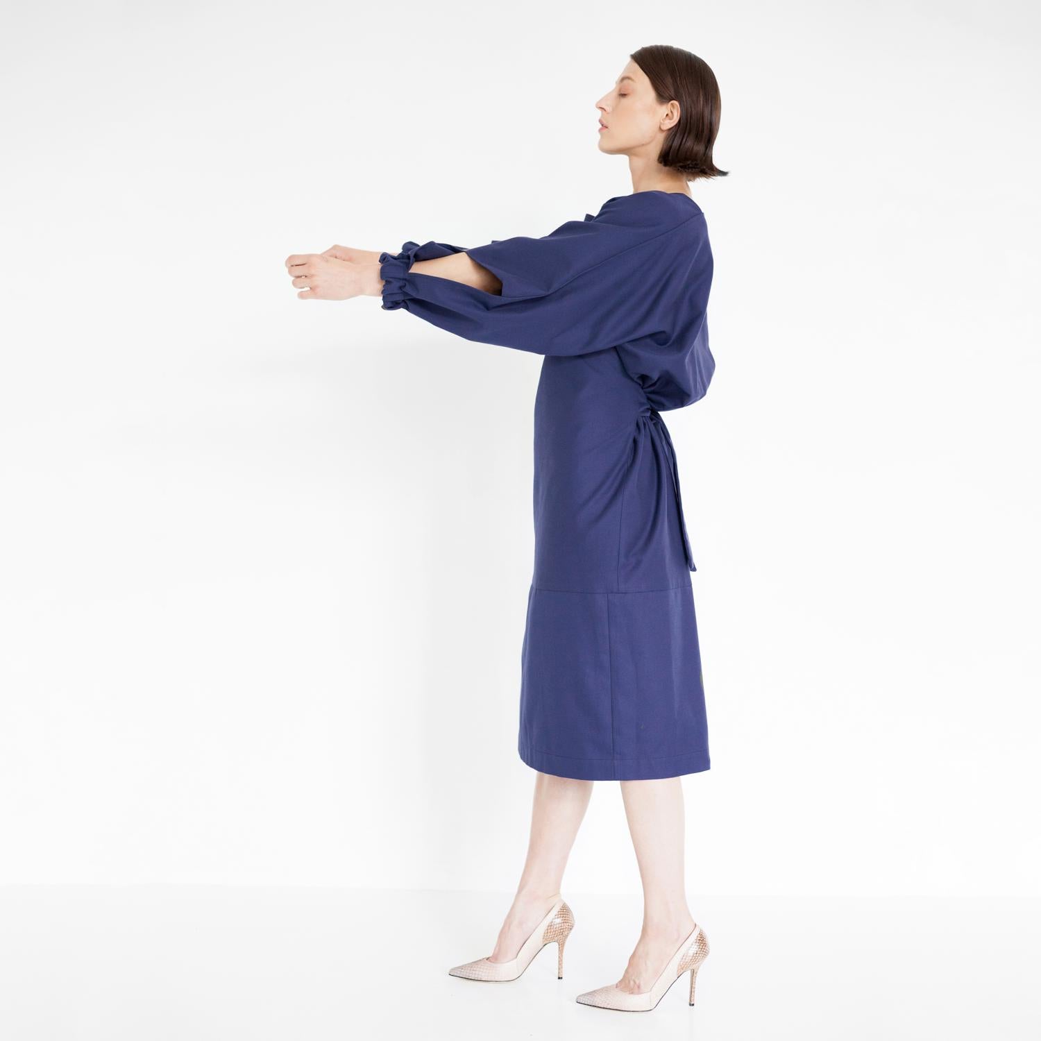 extravagant midi dress with cut out sleeves by Natascha von Hirschhausen fashion design made in Berlin