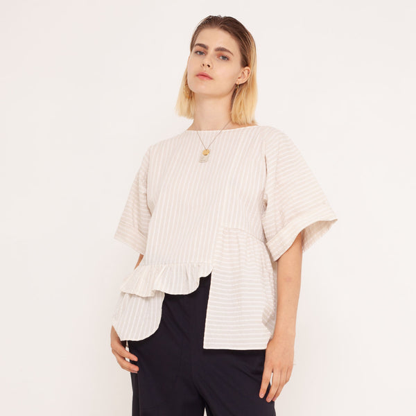 unique blouse with asymmetric flairs and pocket