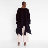 flowing oversized sweater with ruffled sleeves by Natascha von Hirschhausen fashion design made in Berlin