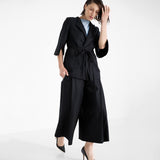 modern pants suit with herringbone pattern by Natascha von Hirschhausen fashion design made in Berlin